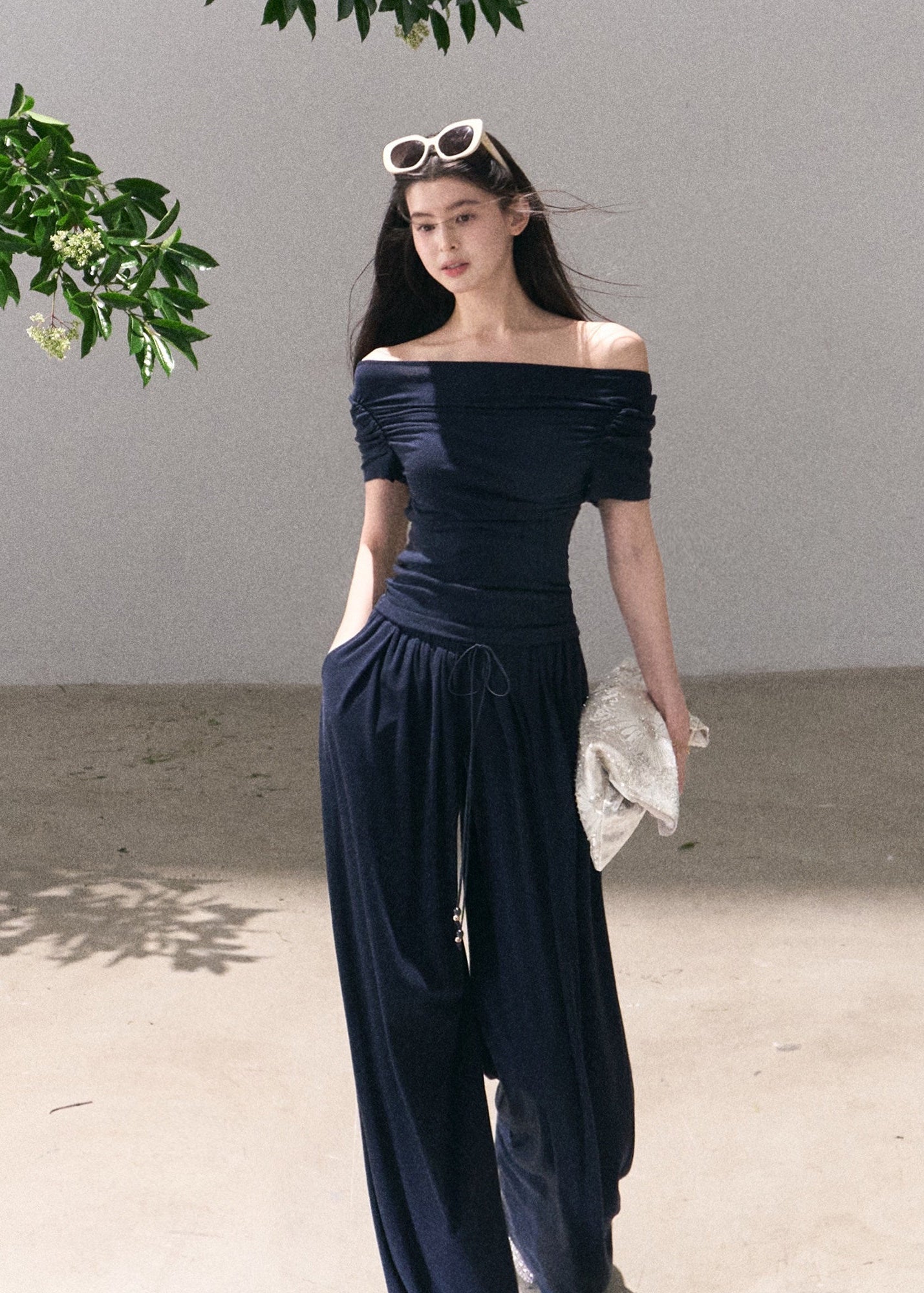 Deep navy off-shoulder top and wide-leg pants set