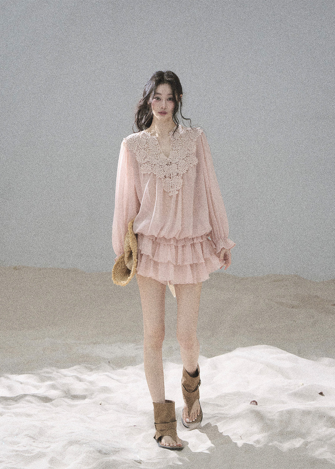 Romantic summer set styled with a woven beach hat