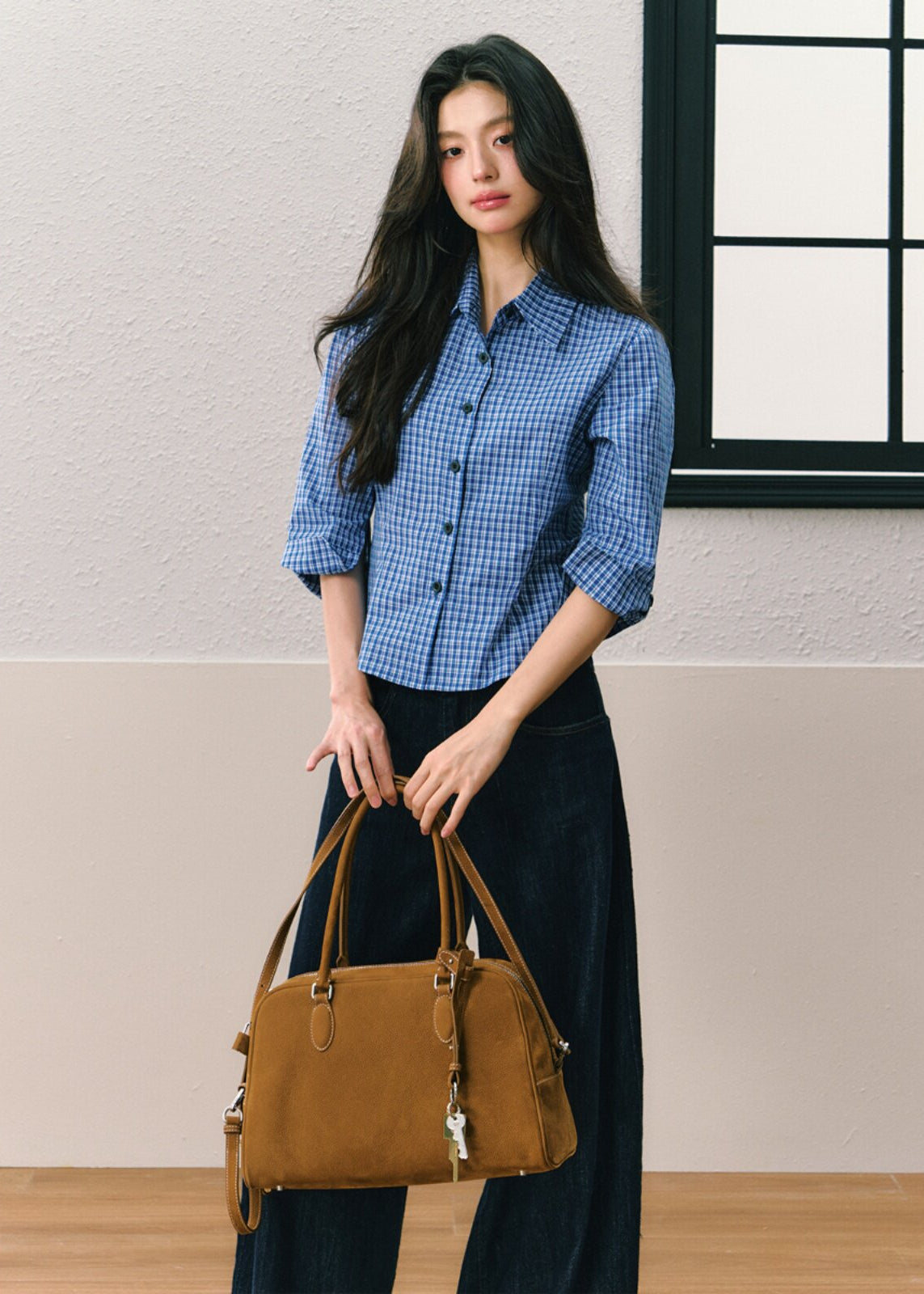 Dark indigo wide-leg jeans with contrasting diagonal front lines