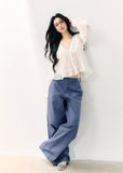 Pale yellow V-neck blouse with double-layer ruffles