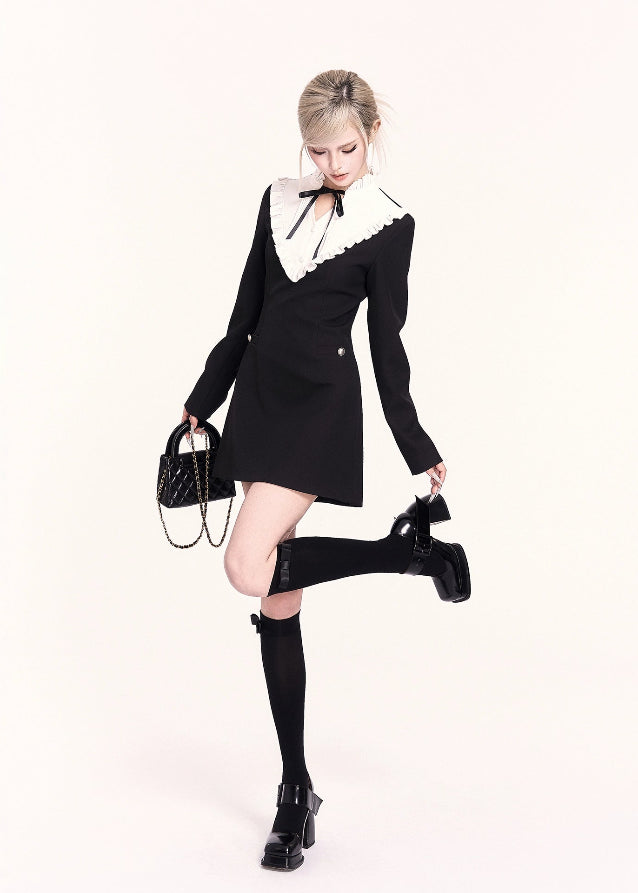 A refined Korean-style holiday dress set featuring a lace-trimmed bow collar mini dress paired with a luxurious woolen cape. The silhouette is soft yet slimming, blending sweet elegance with VOCK’s signature modern edge. Perfect for winter dates, parties, and seasonal photos.