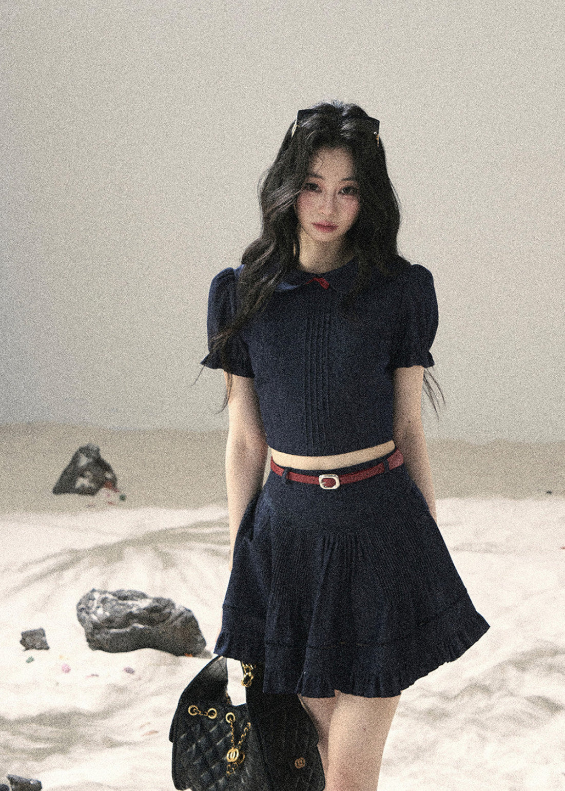Dark navy collegiate outfit with mini skirt