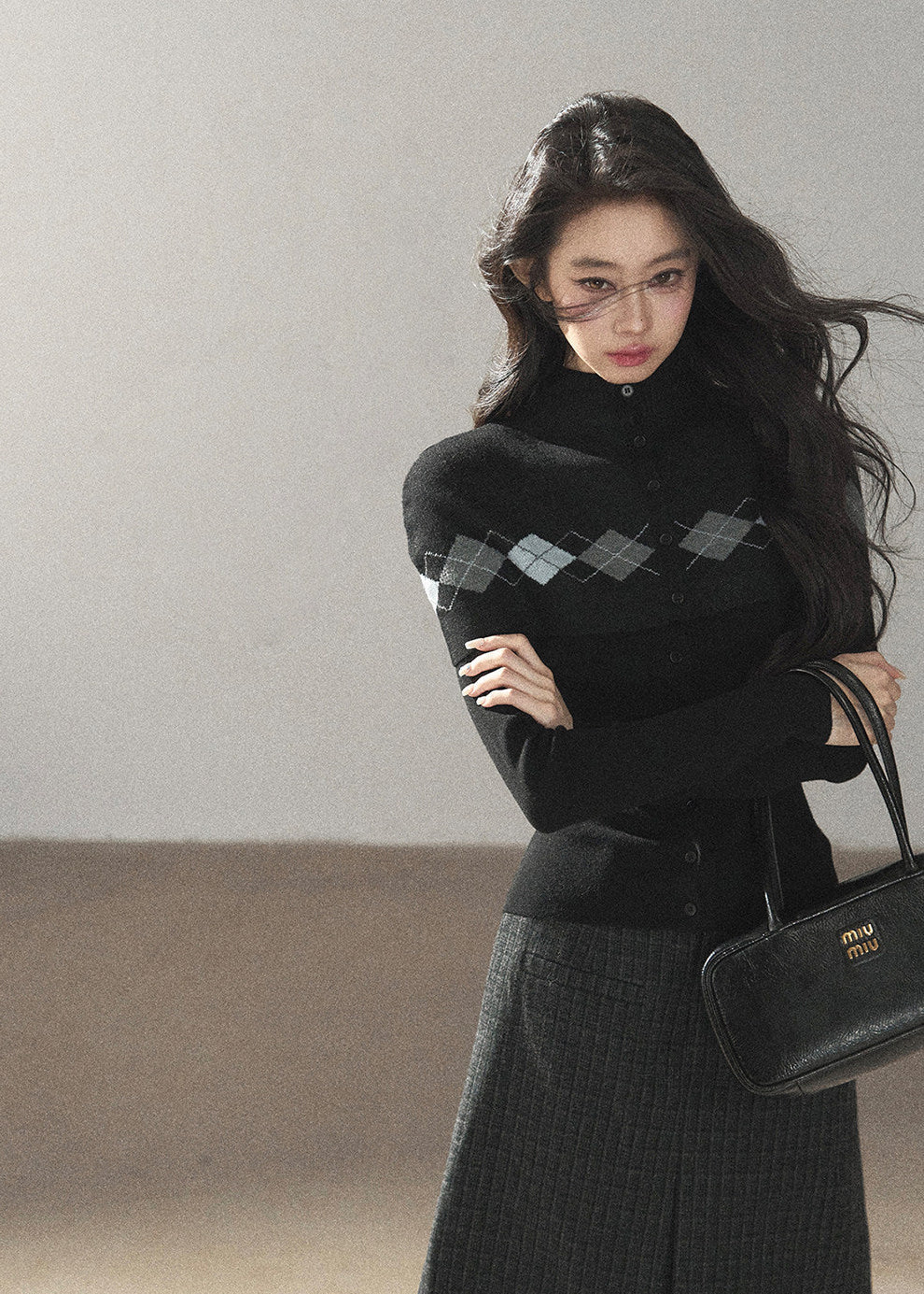 Black argyle shawl layered wool blend cardigan with diamond pattern