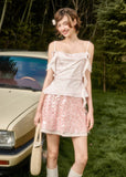Feminine pink two-piece set with embellished skirt