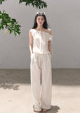 Ivory draped top and wide-leg pants set