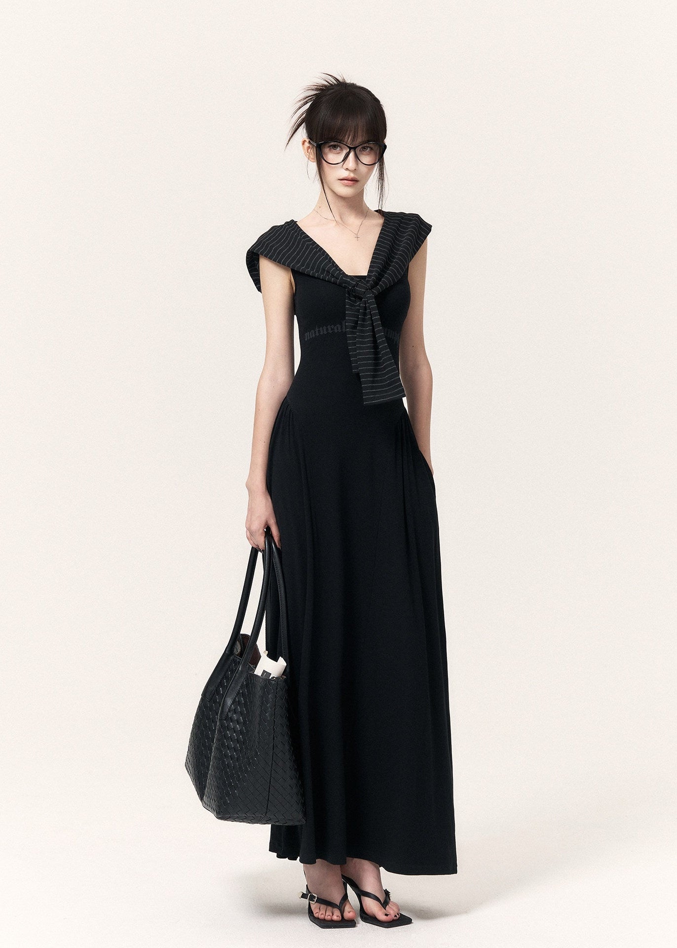Women’s black fitted maxi dress and striped outer-layer set