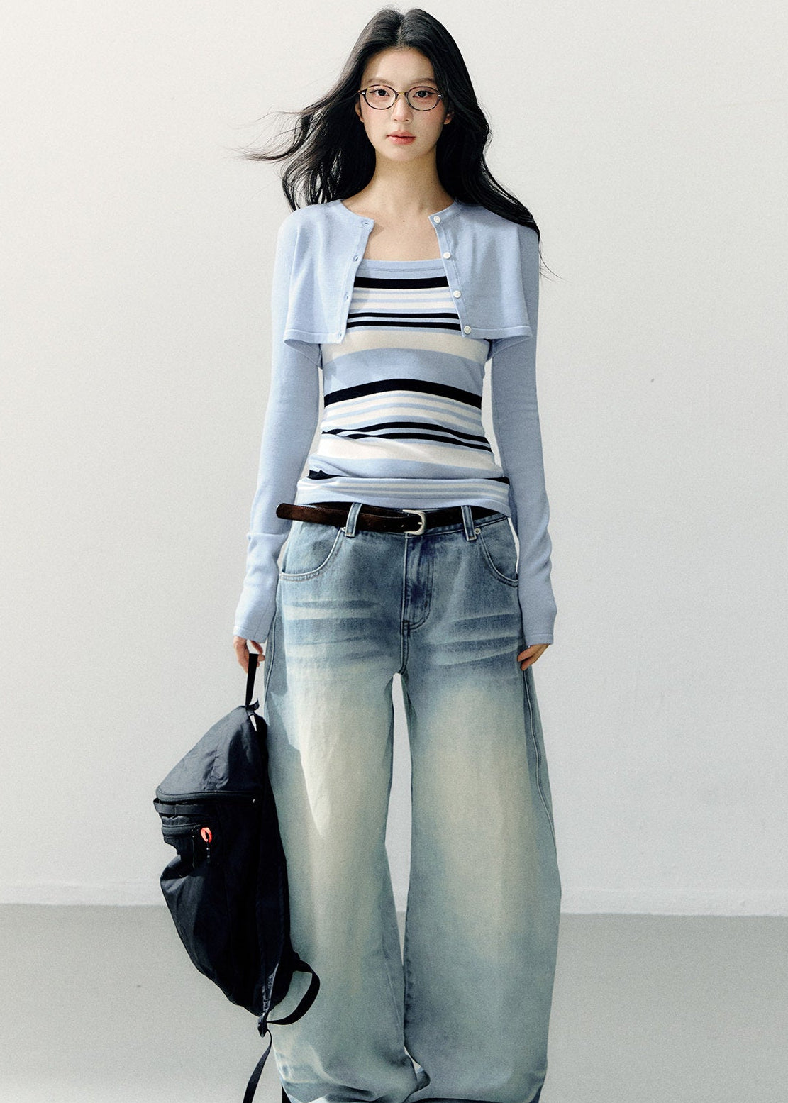 Pale blue cropped bolero with a navy and white striped camisole