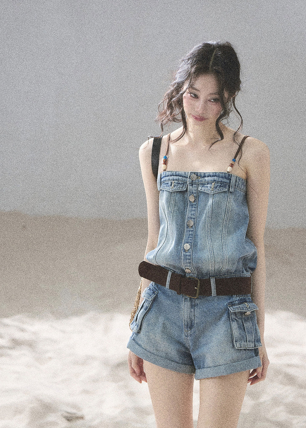Beaded strap denim romper in light blue wash