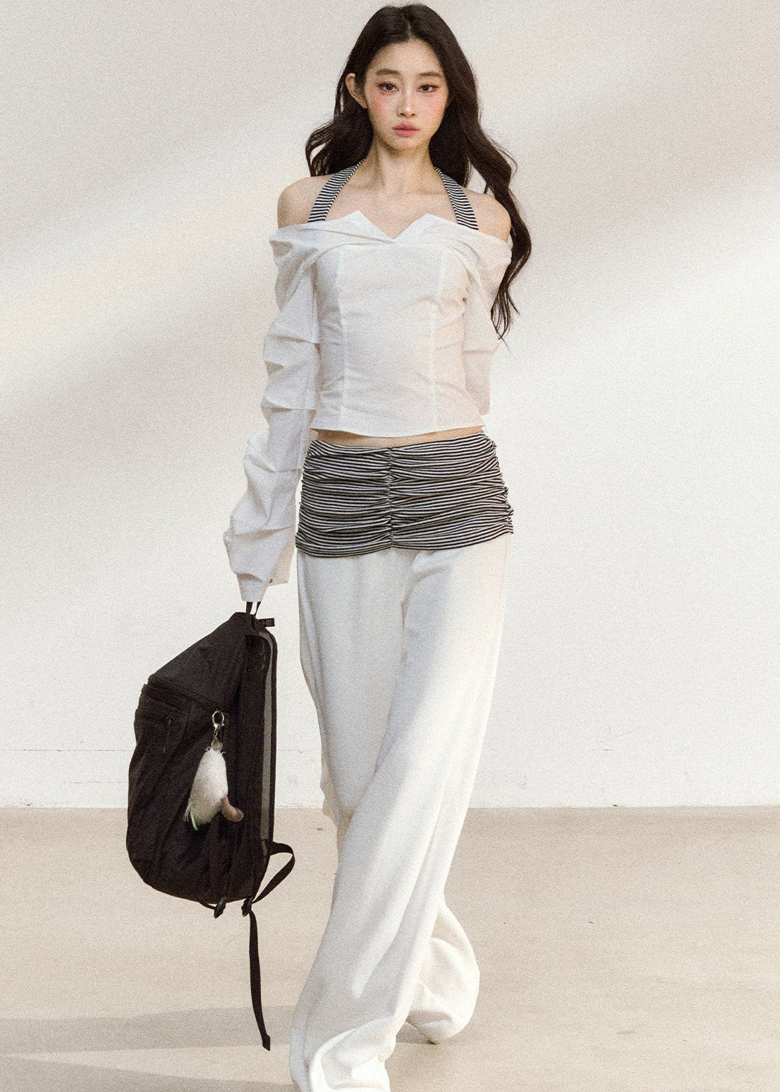 White wide-leg trousers with a ruched striped waistband