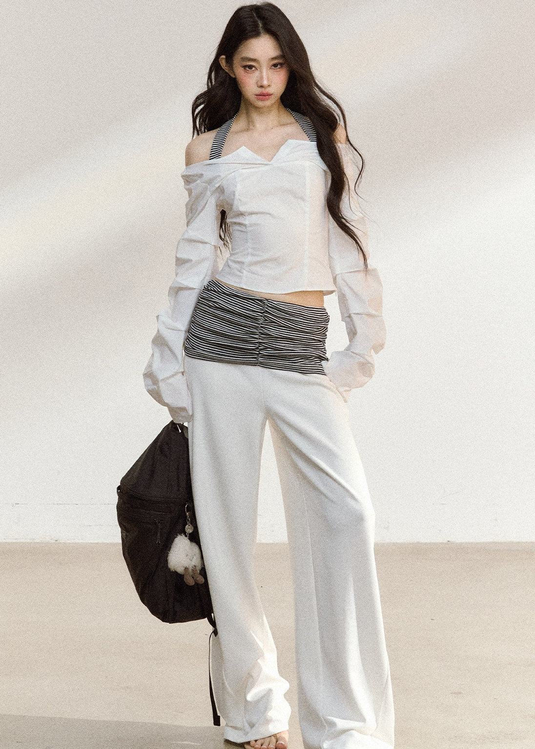 White wide-leg trousers with a ruched striped waistband