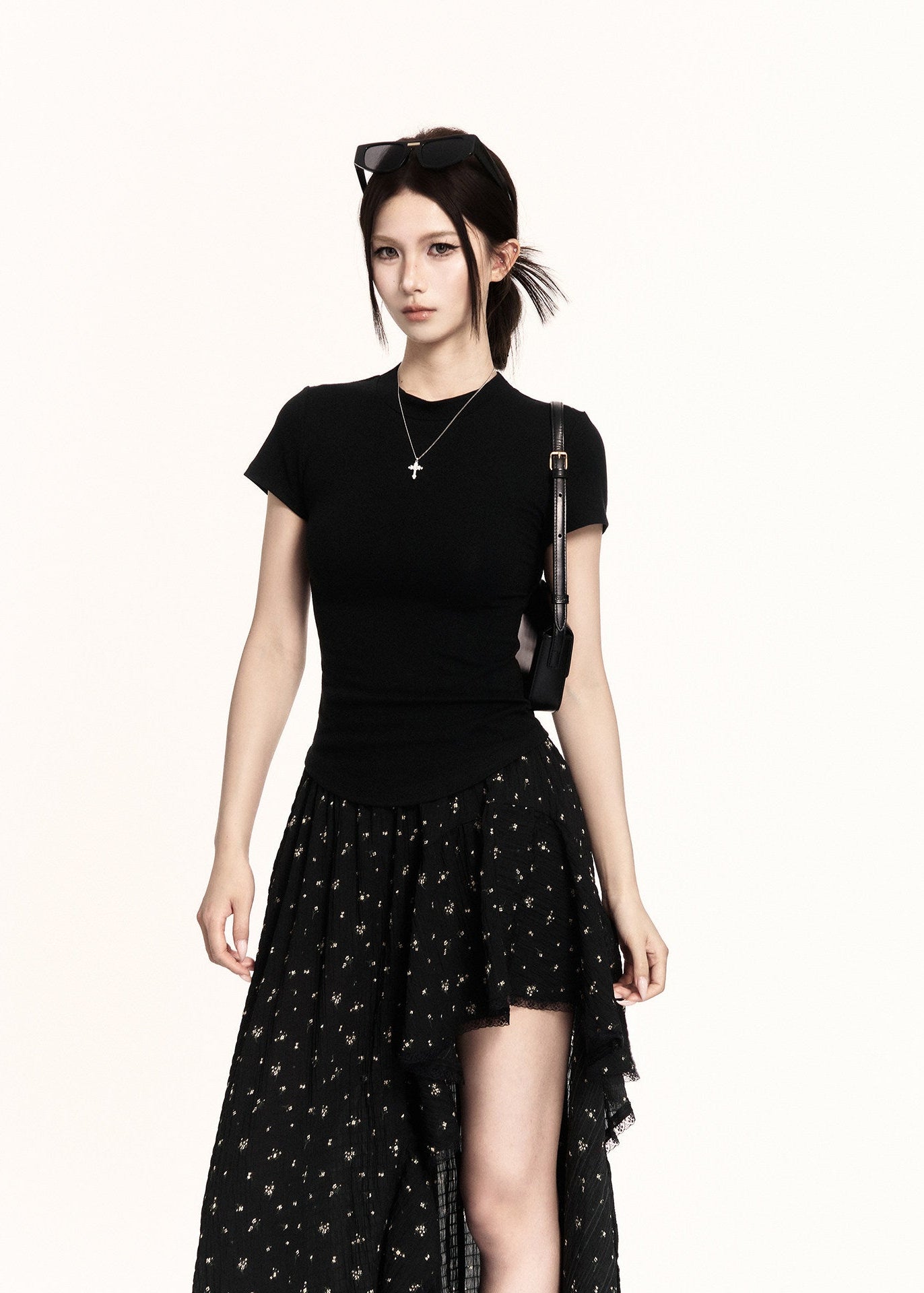 Black high-low ruffle skirt with a sheer layered hem