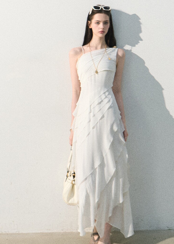 Asymmetrical white summer dress with a flowing silhouette