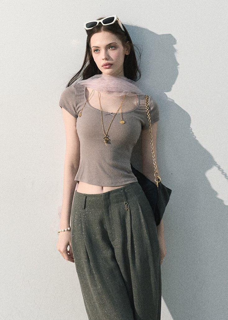 Minimalist high rise wide leg pants with subtle shimmer detail