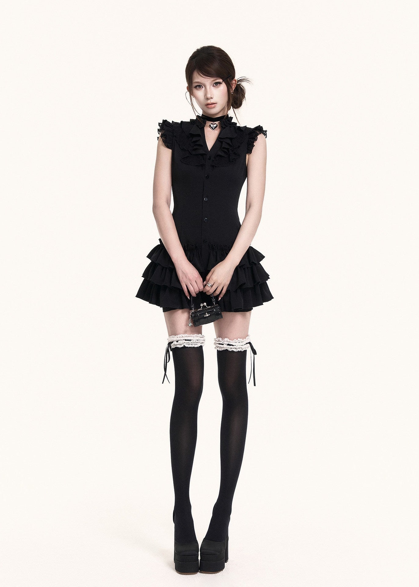 Dark romantic mini dress with soft flutter sleeve detail