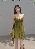 Romantic mini dress with delicate straps and flowing handkerchief hem