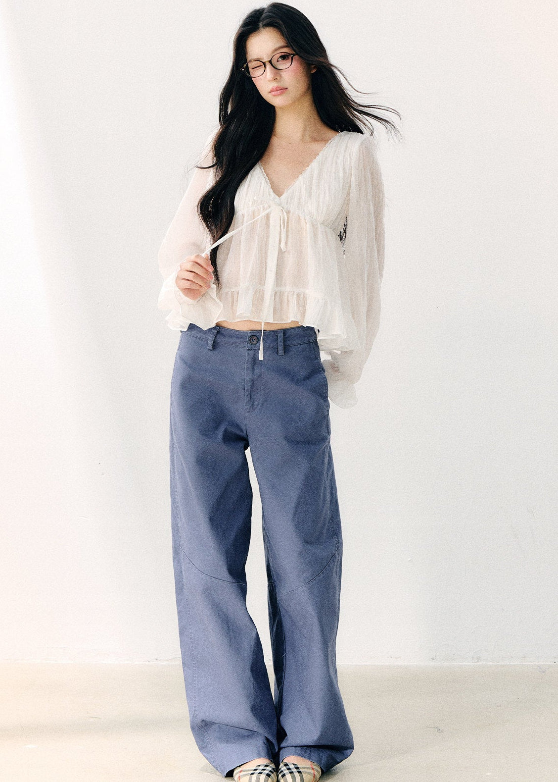 Pale yellow V-neck blouse with double-layer ruffles