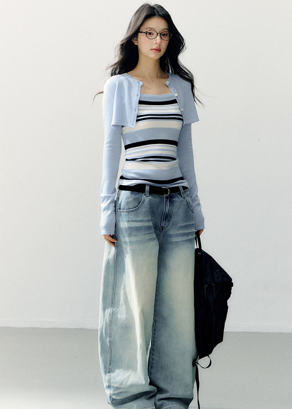 Pale blue cropped bolero with a navy and white striped camisole