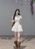 White cotton short-sleeve top and tiered mini skirt two-piece set