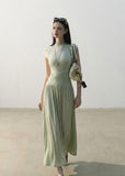 Cream slim-fit knit maxi dress with flowing skirt