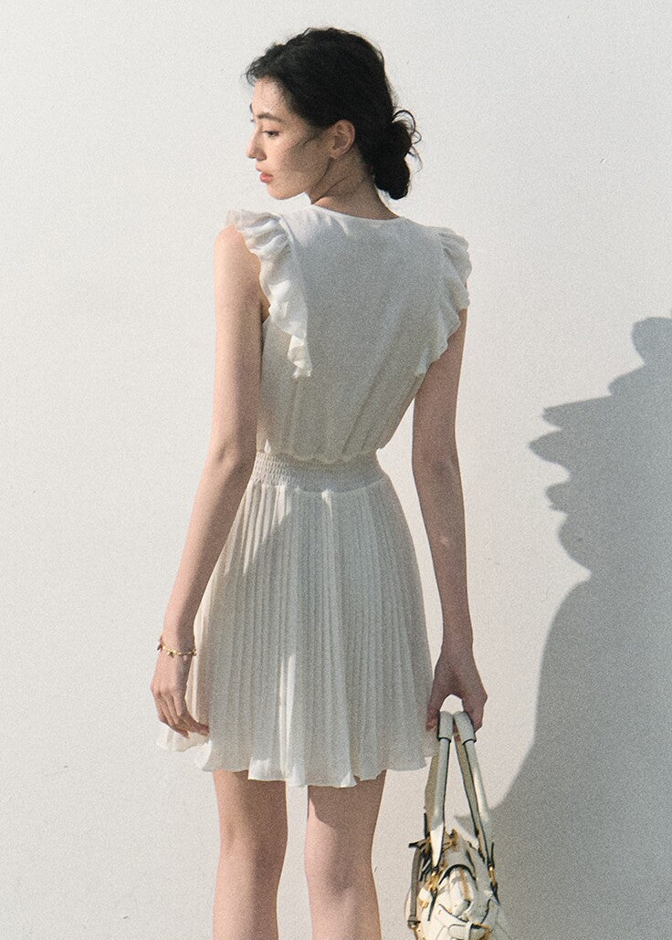 White ruffle pleated dress with a softly defined waist