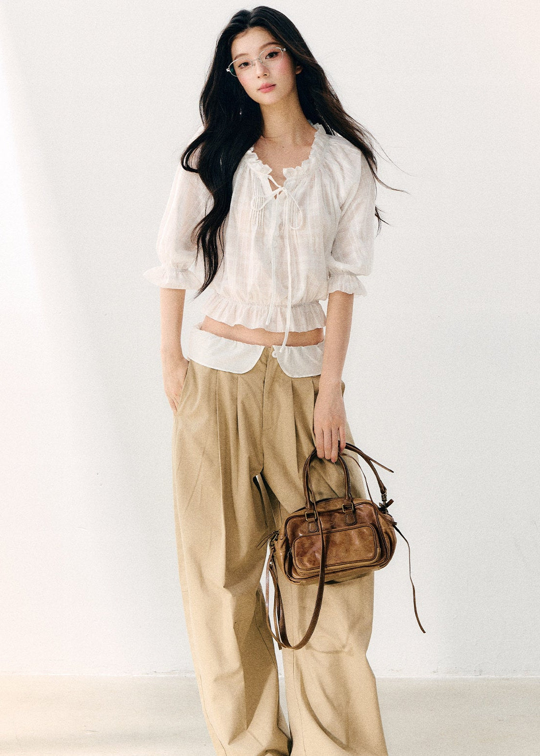 White cotton blouse with gathered wave pleats and puff sleeves