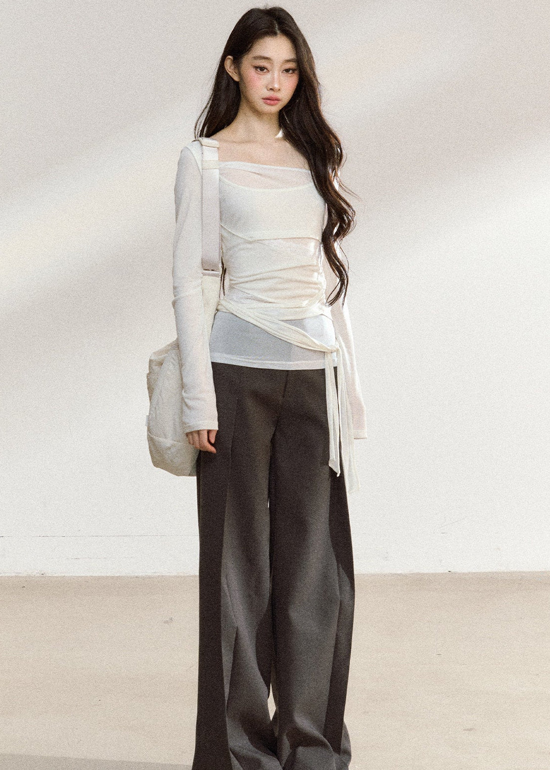 Dark gray relaxed wide-leg trousers with a tailored waistband