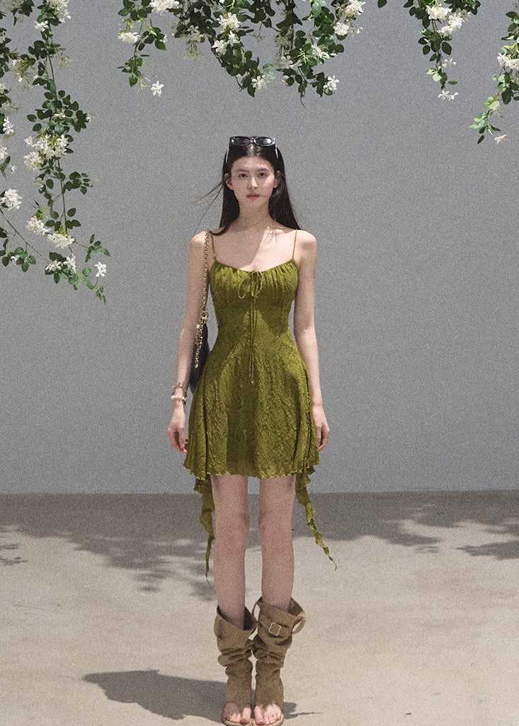 Romantic mini dress with delicate straps and flowing handkerchief hem