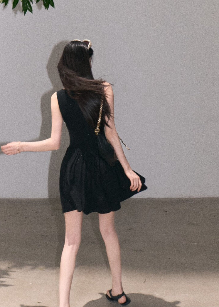 Black resort-style tank dress with semi-sheer lace panel