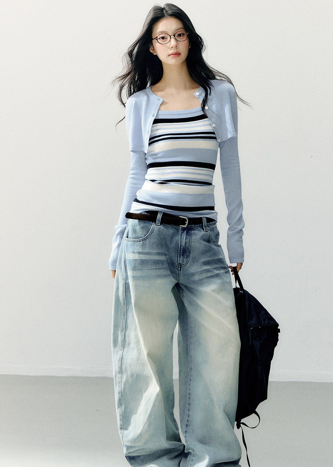 Pale blue cropped bolero with a navy and white striped camisole