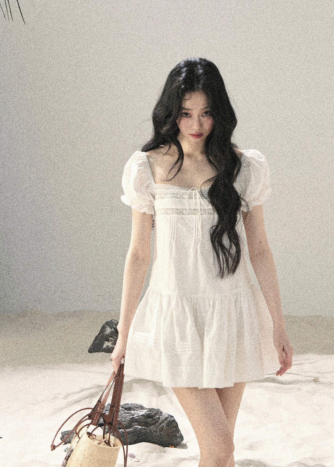 Feminine white dress with softly flared skirt