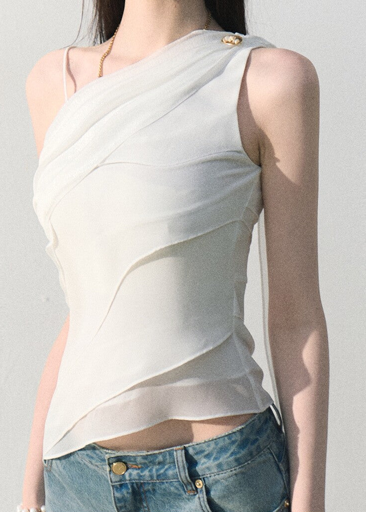 White waist-defining top with an elegant one-shoulder neckline