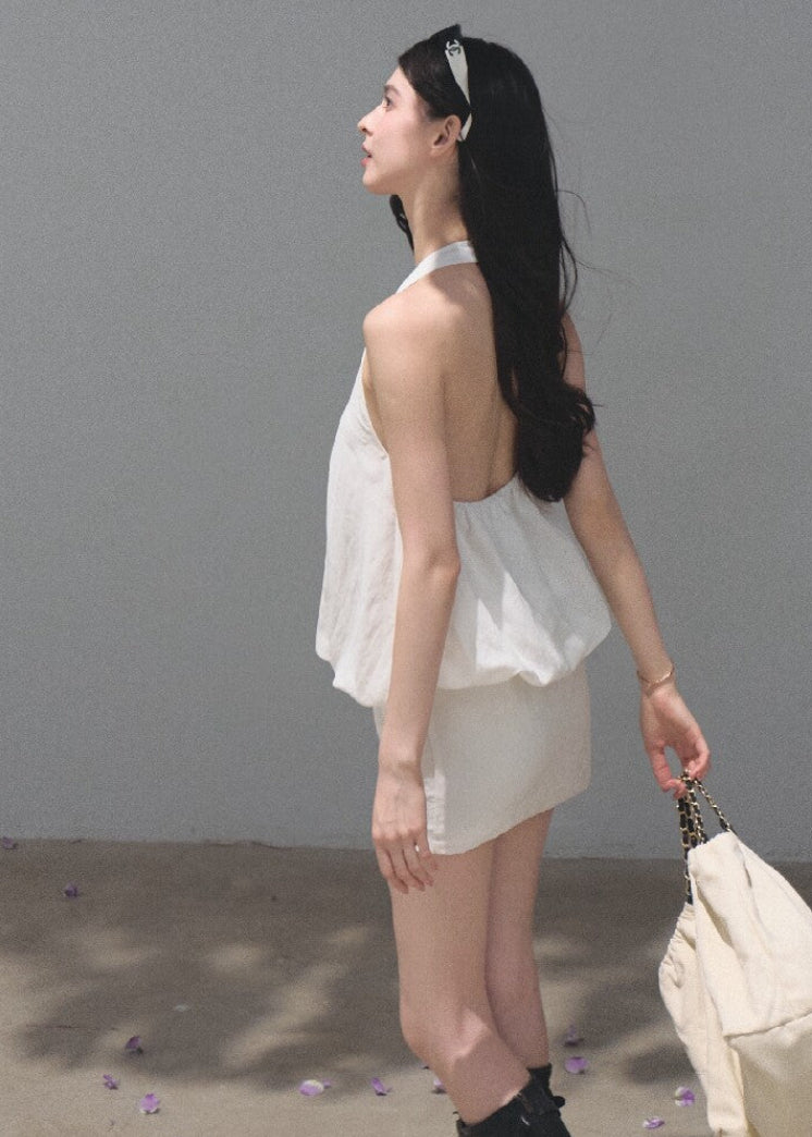 White open-back halter dress crafted from a lyocell-linen blend