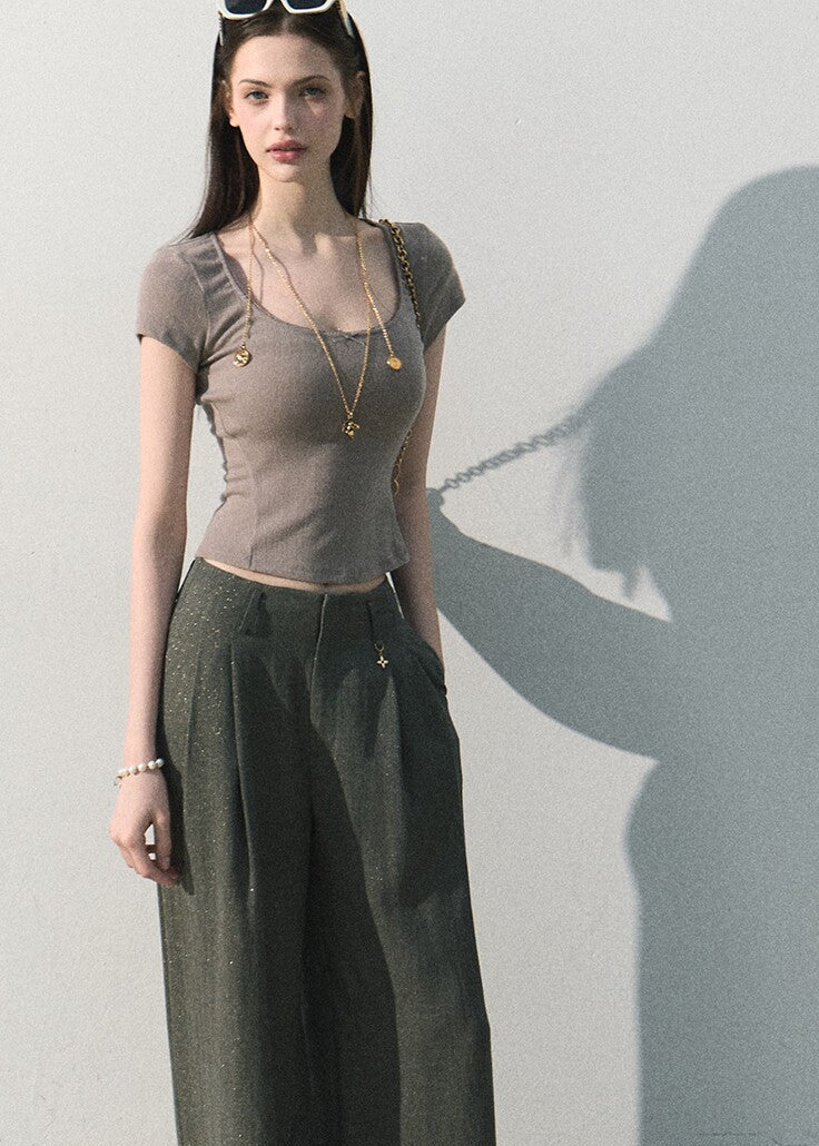 Minimalist high rise wide leg pants with subtle shimmer detail