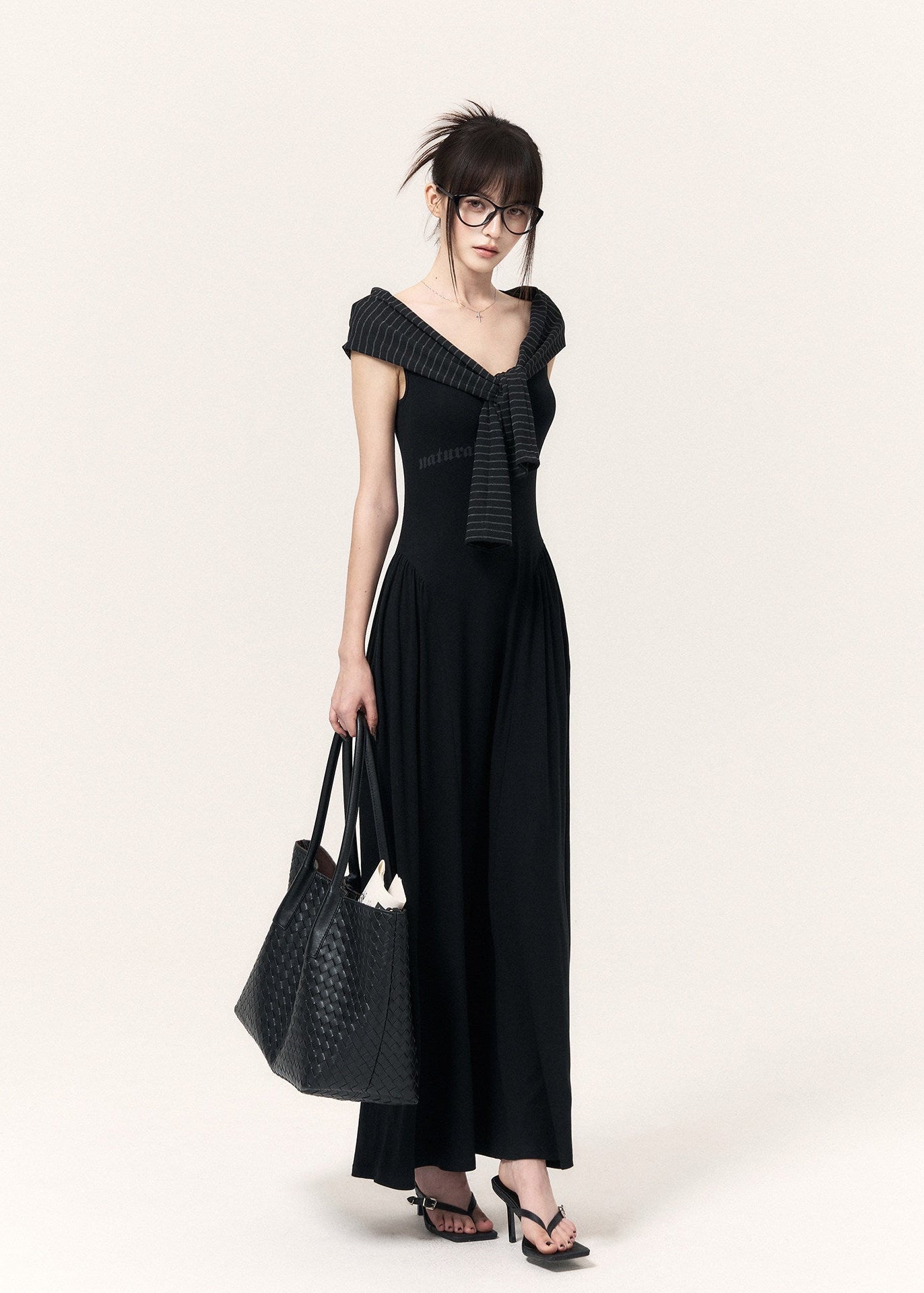 Women’s black fitted maxi dress and striped outer-layer set