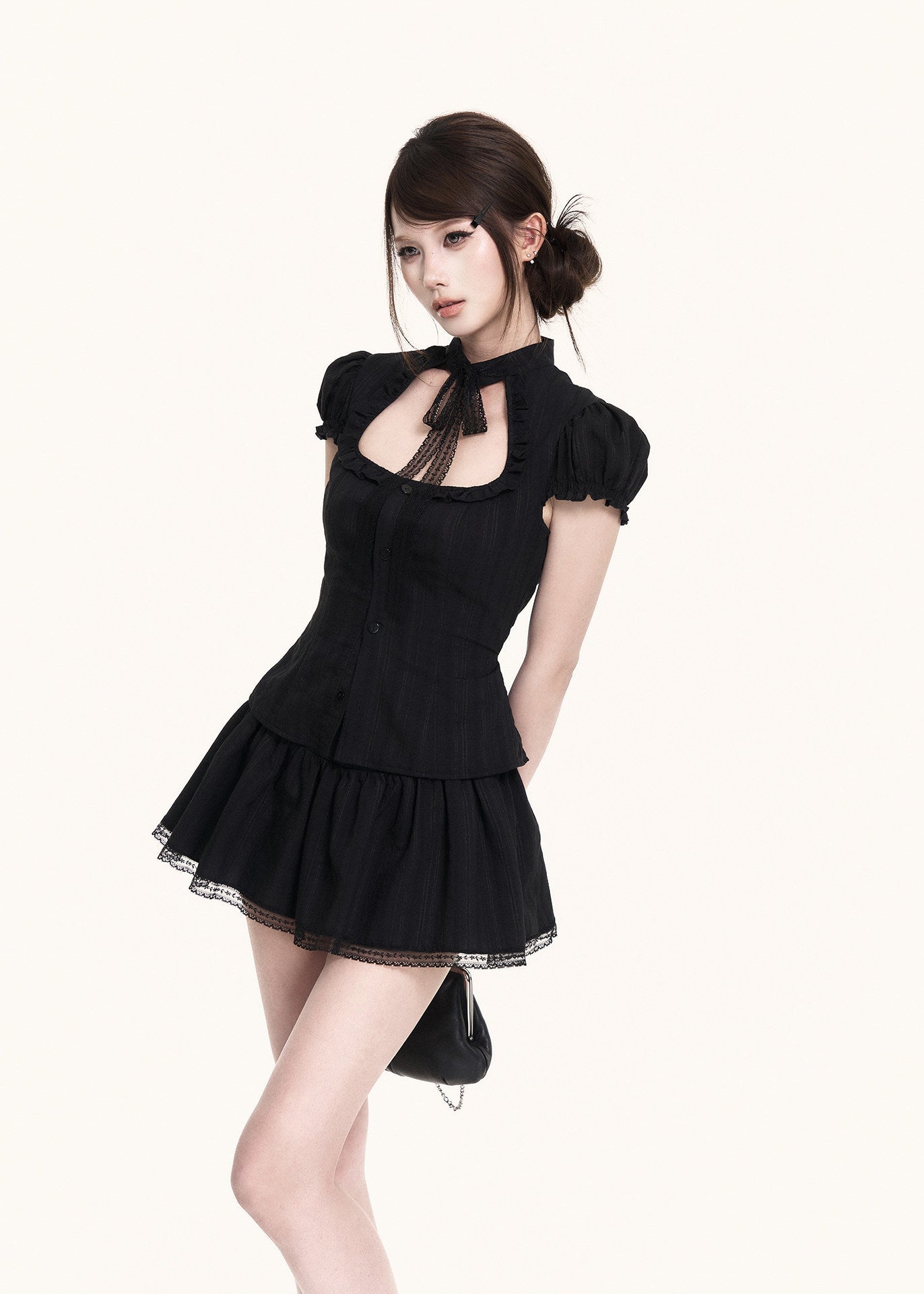 Lace-trim black mini set with a waist-defining silhouette