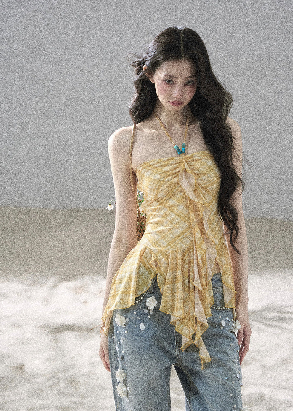 Romantic golden plaid top with a draped handkerchief hem