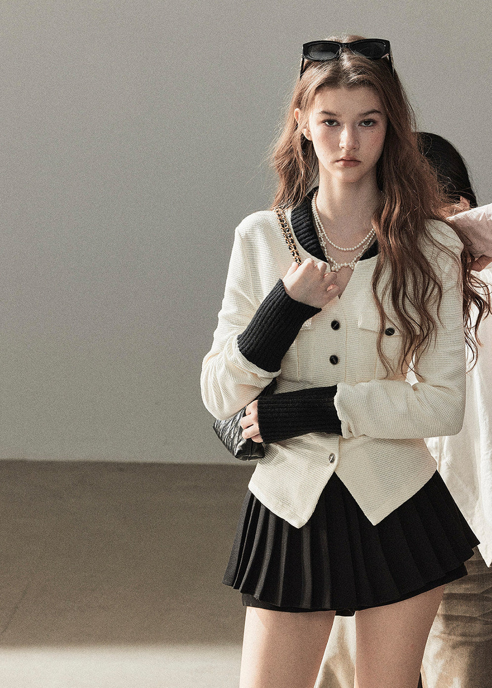 Women's textured V-neck cardigan and pleated mini skirt two-piece set