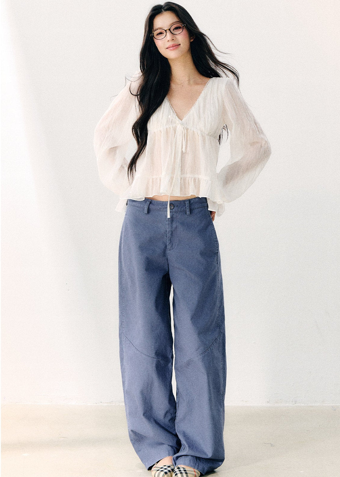 Pale yellow V-neck blouse with double-layer ruffles