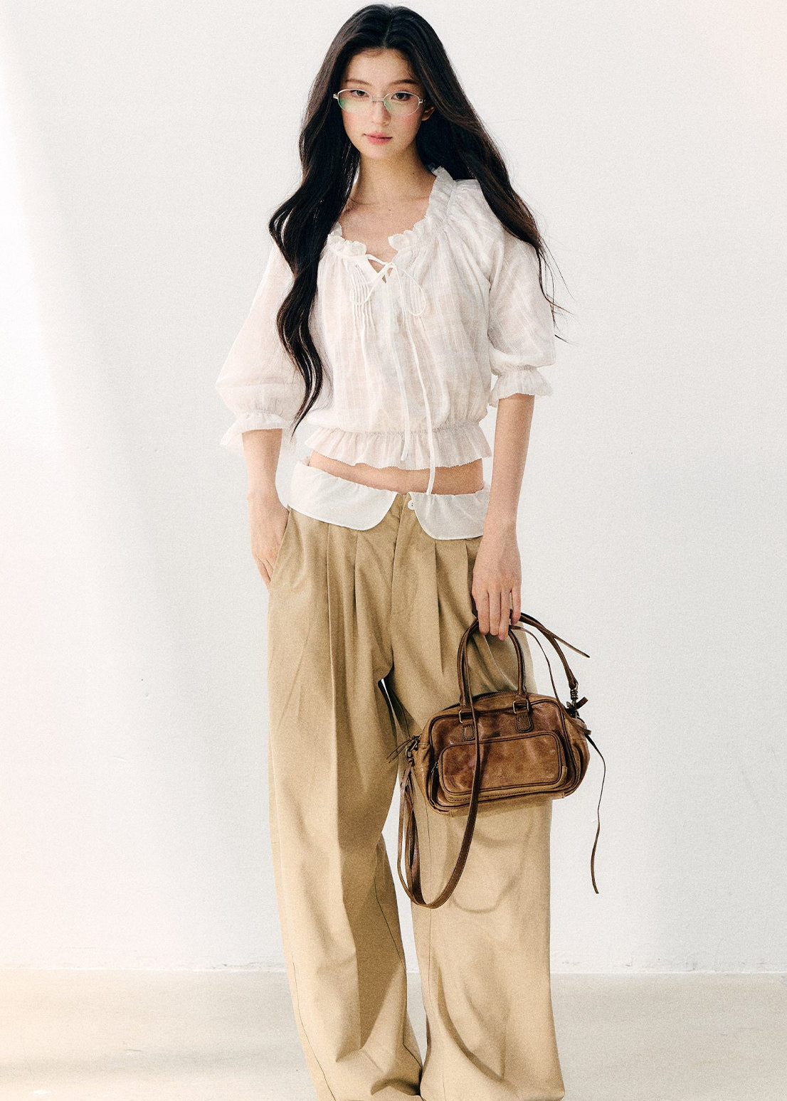 White cotton blouse with gathered wave pleats and puff sleeves