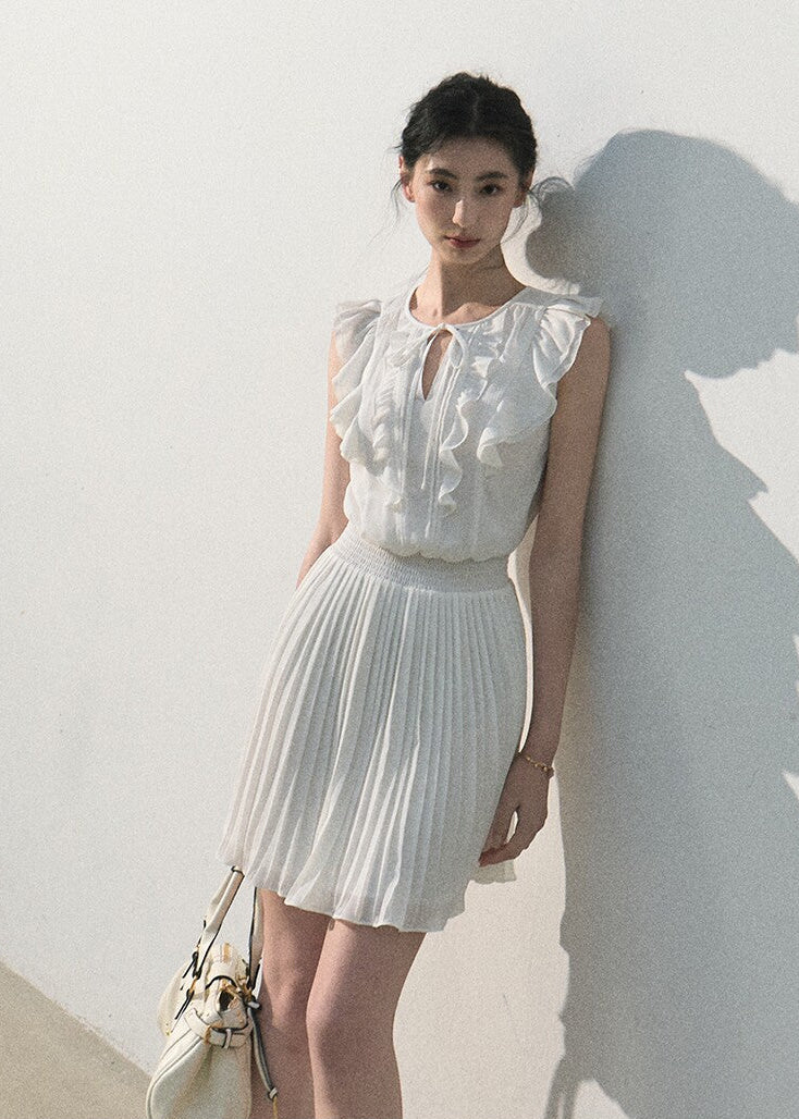 White ruffle pleated dress with a softly defined waist