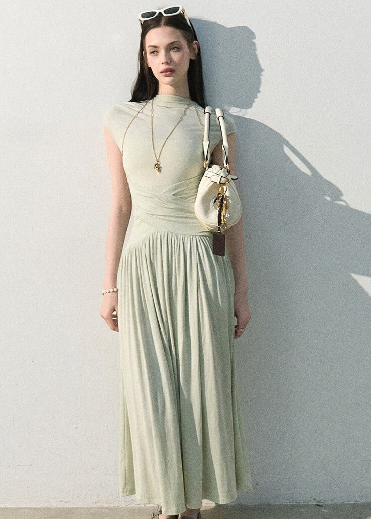 Sage green fitted bodice dress with full-length skirt
