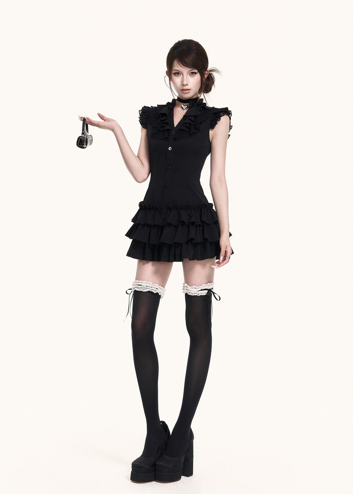 Edgy black frill mini dress with layered ruffles