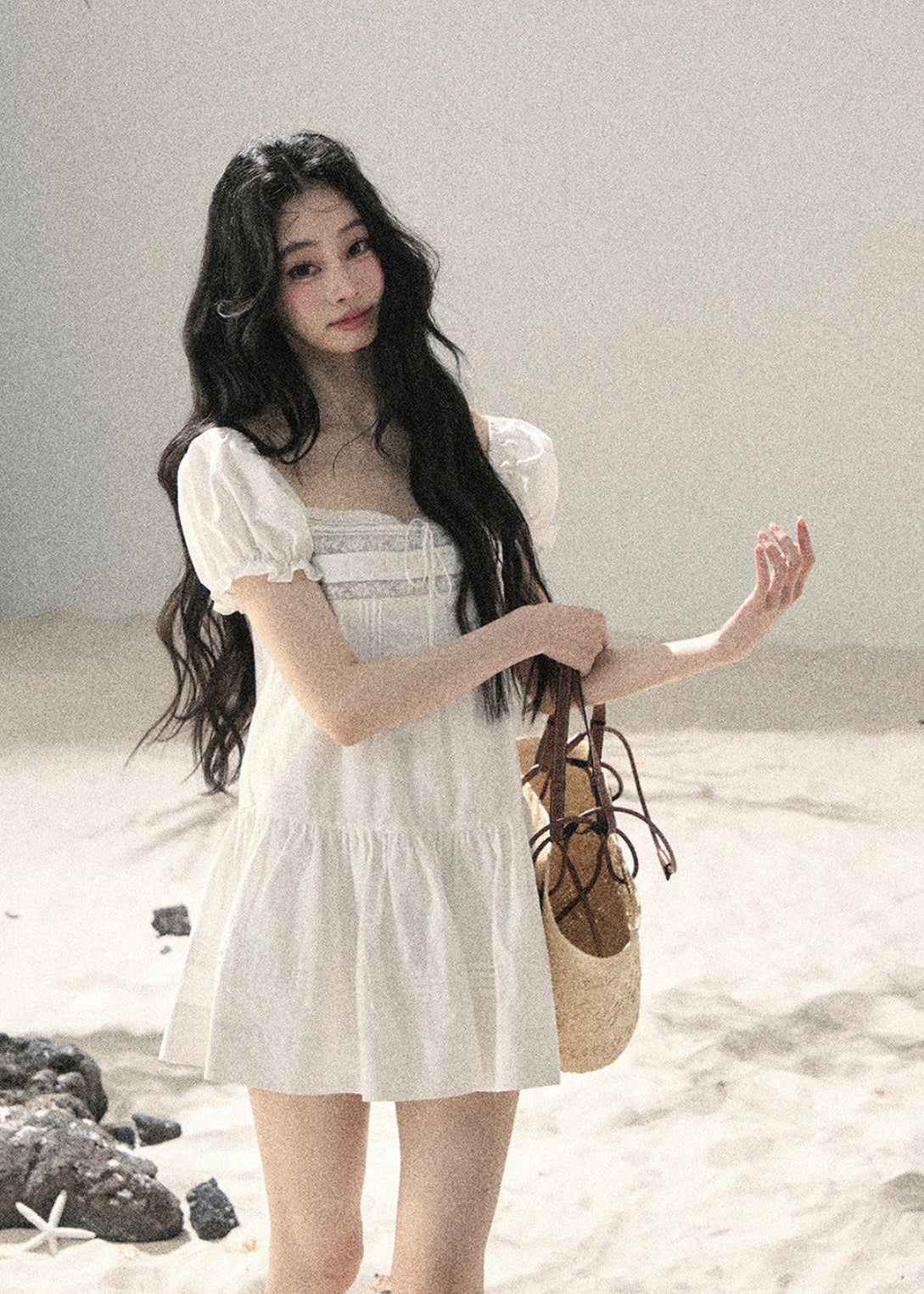 Feminine white dress with softly flared skirt