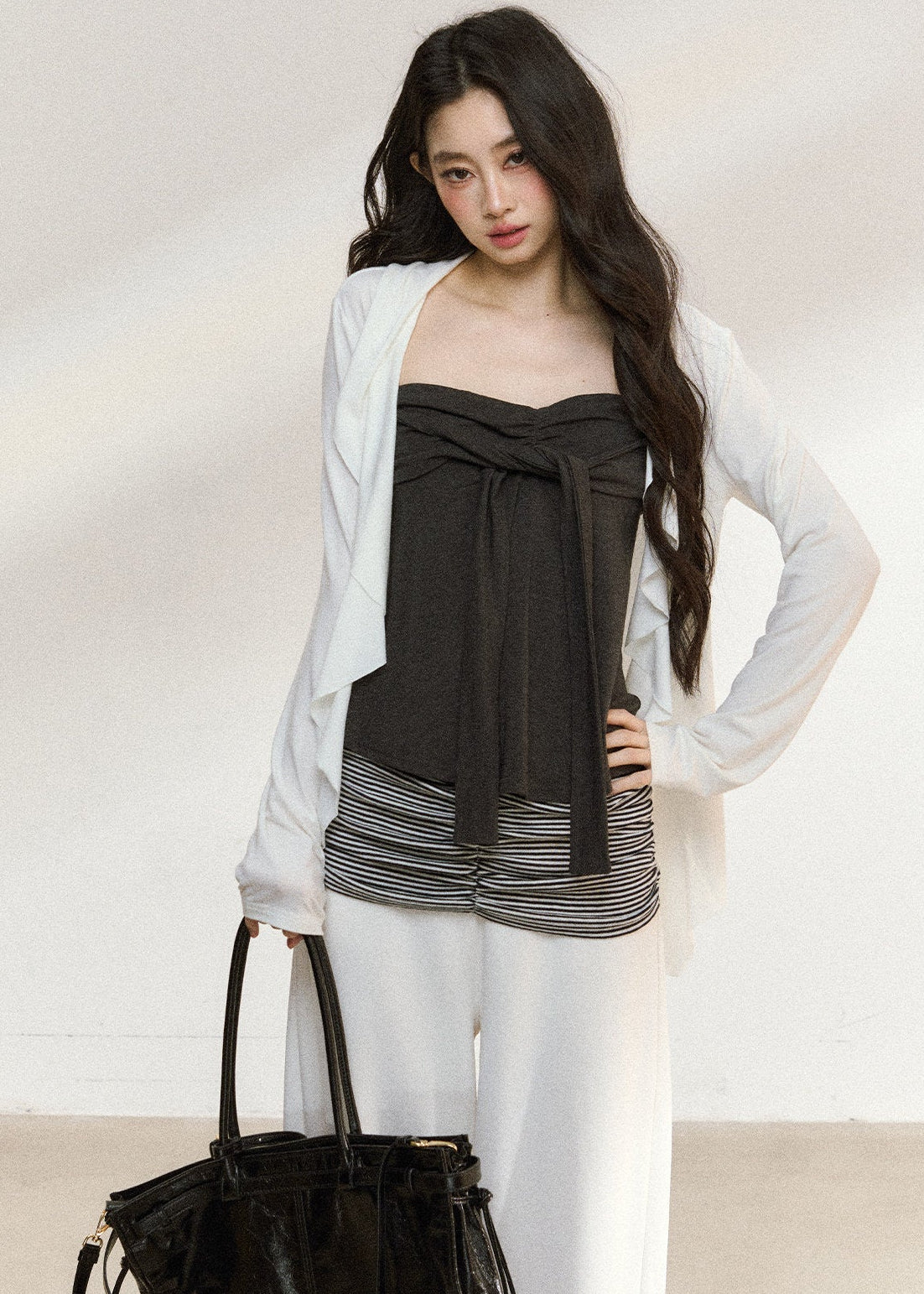 Charcoal camisole styled with a lightweight white cardigan