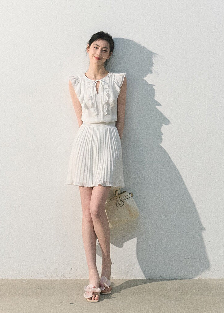 White ruffle pleated dress with a softly defined waist