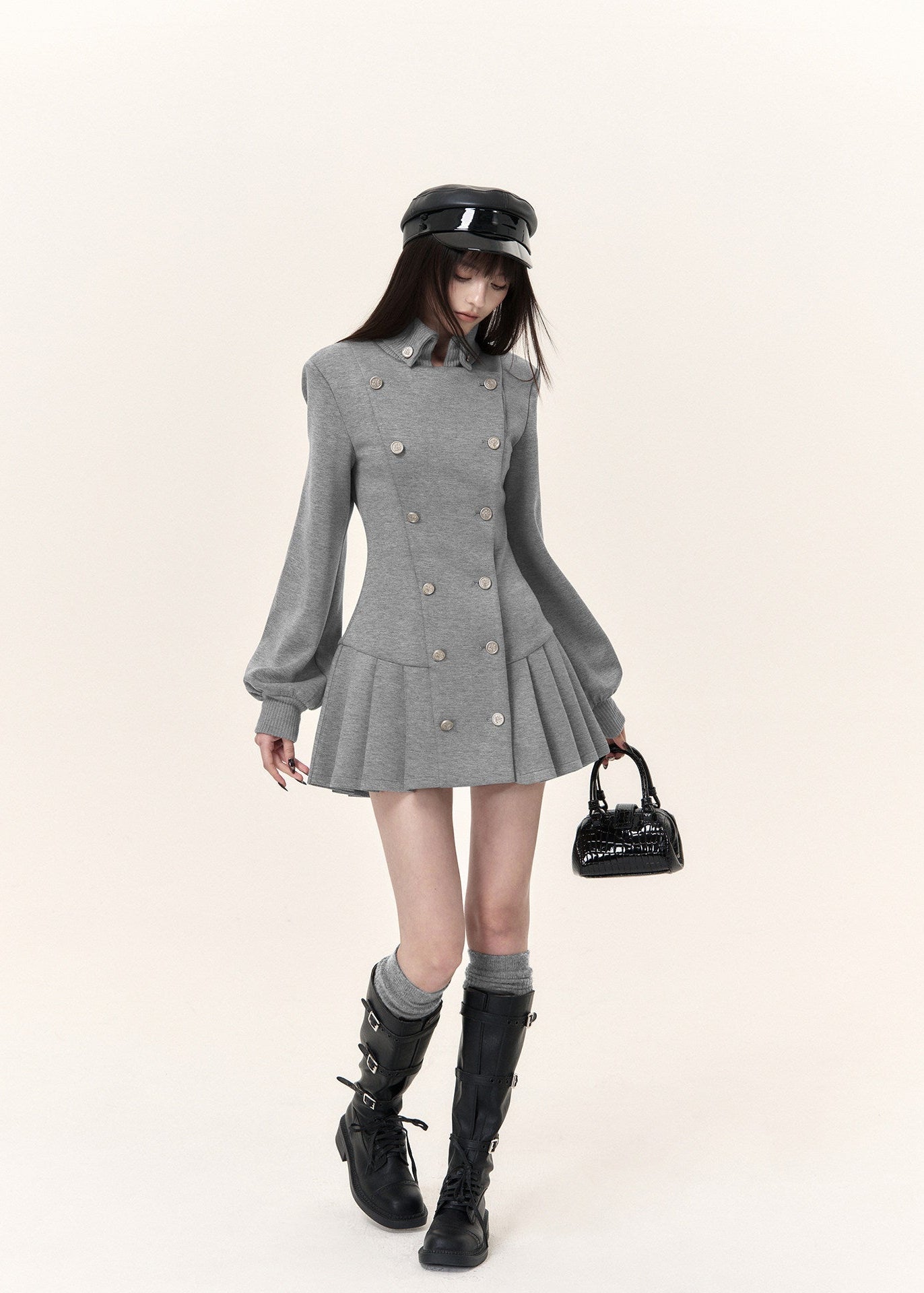 Grey double-breasted pleated mini dress with military-inspired stand collar