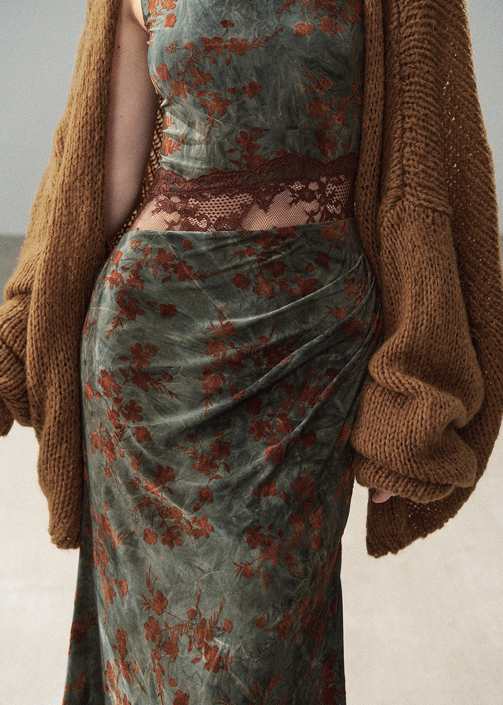 Green and rust floral print long dress with lace cutout detail