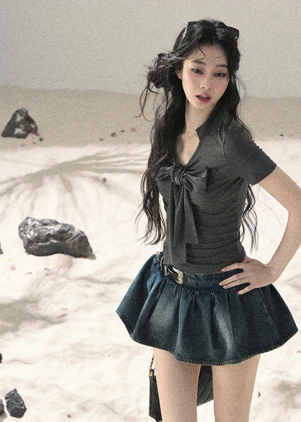 Charcoal waist-fit top with feminine bow neckline