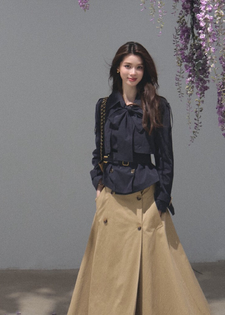 Khaki A-line midi skirt with a coordinating buckle belt