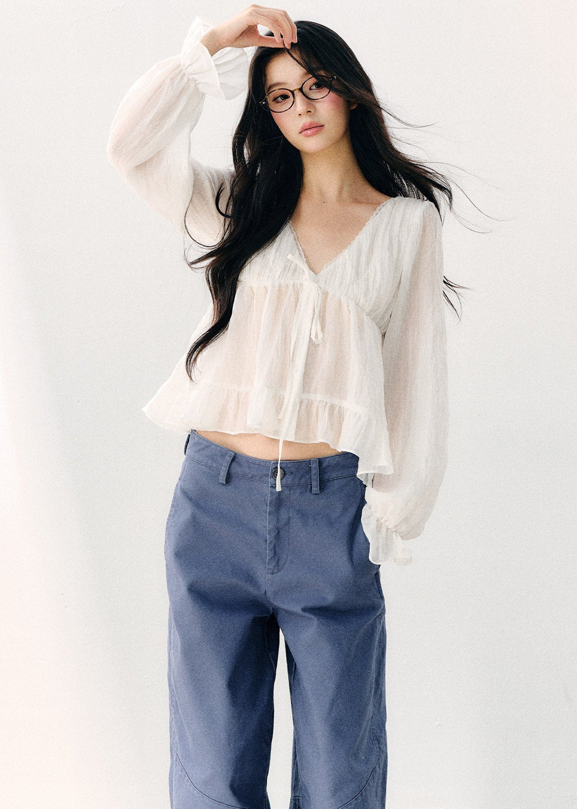 Pale yellow V-neck blouse with double-layer ruffles
